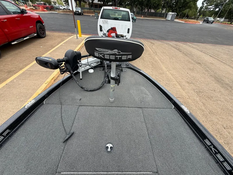 Slide: The Image of 2022 Skeeter ZX 150 boat with trolling motor in parking lot. - 30