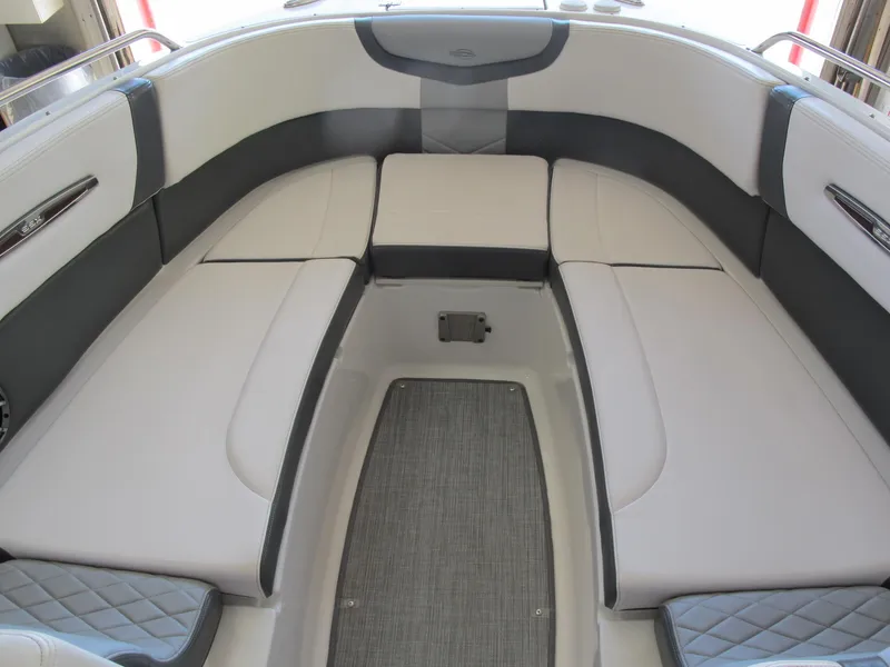 Slide: The Image of 2018 Chaparral 287 SSX boat interior with cushioned seating and sleek design. - 3