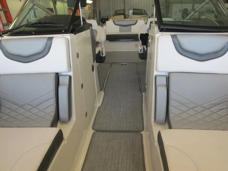 Slide: The Image of Interior of a 2018 Chaparral 287 SSX boat with gray and white seating. - 4