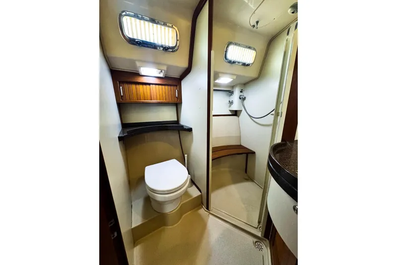 Slide: The Image of Luxurious bathroom in 2004 Island Packet 485 yacht with shower and toilet. - 40
