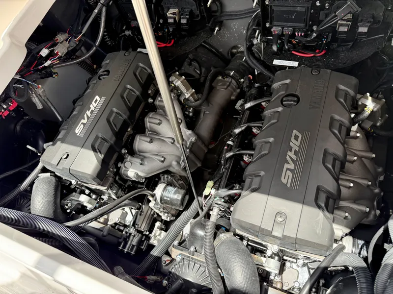 Slide: The Image of 2025 Yamaha Boats 255 FSH Sport H engine compartment with dual SVHO engines. - 11