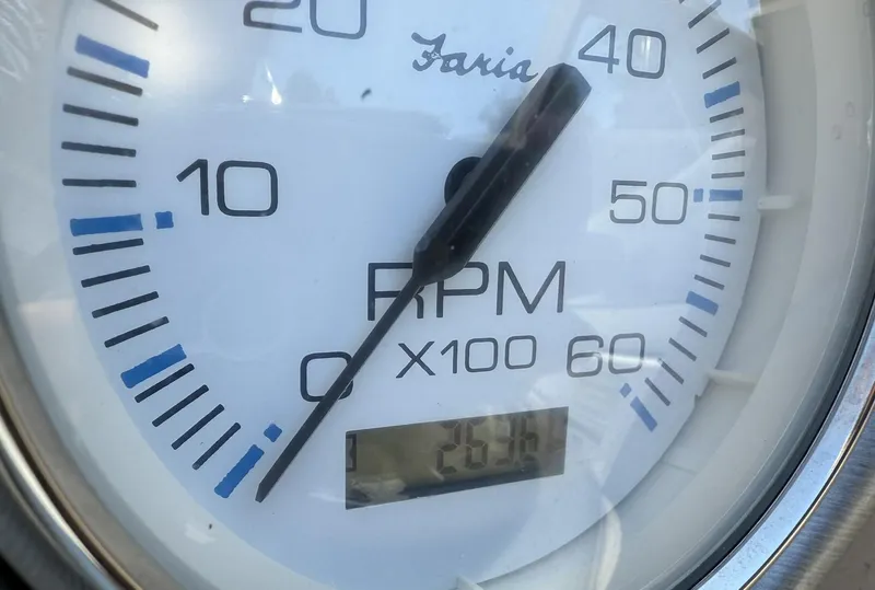 Slide: The Image of Close-up of a Faria RPM gauge showing 2500 RPM on a 2006 Hurricane SD 237. - 9