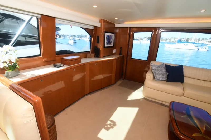 Slide: The Image of Luxurious interior of 2000 Viking Boats 65 C yacht with elegant wood finishes and waterfront view. - 38