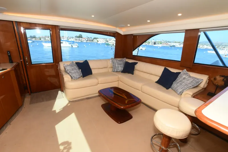 Slide: The Image of Luxurious interior of 2000 Viking Boats 65 C yacht with plush seating and scenic ocean view. - 39
