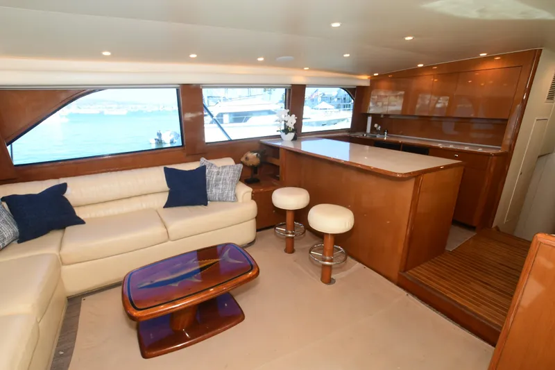 Slide: The Image of Luxurious interior of 2000 Viking Boats 65 C yacht with elegant seating and bar area. - 42