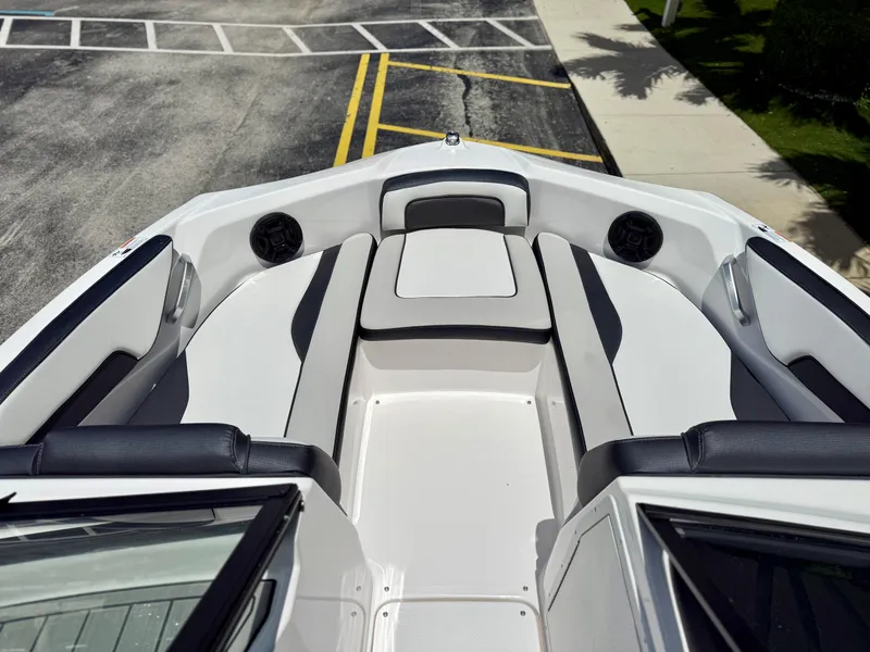 Slide: The Image of 2025 Yamaha Boats SX195 interior with sleek seating and modern design. - 13