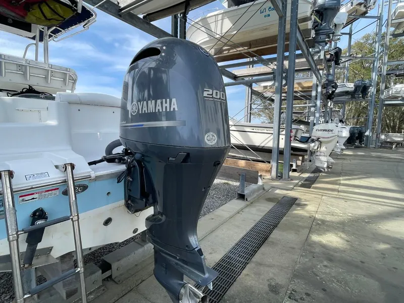 Slide: The Image of 2017 Sea Hunt Ultra 234 with Yamaha 200 outboard motor in storage facility. - 8