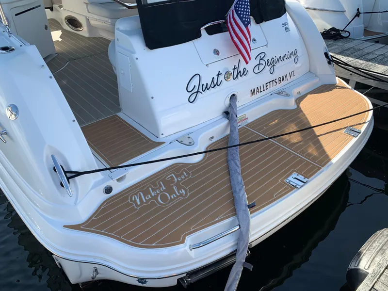 Slide: The Image of 2006 Sea Ray 340 Sundancer docked, featuring "Just the Beginning" and "Naked Feet Only" text. - 14