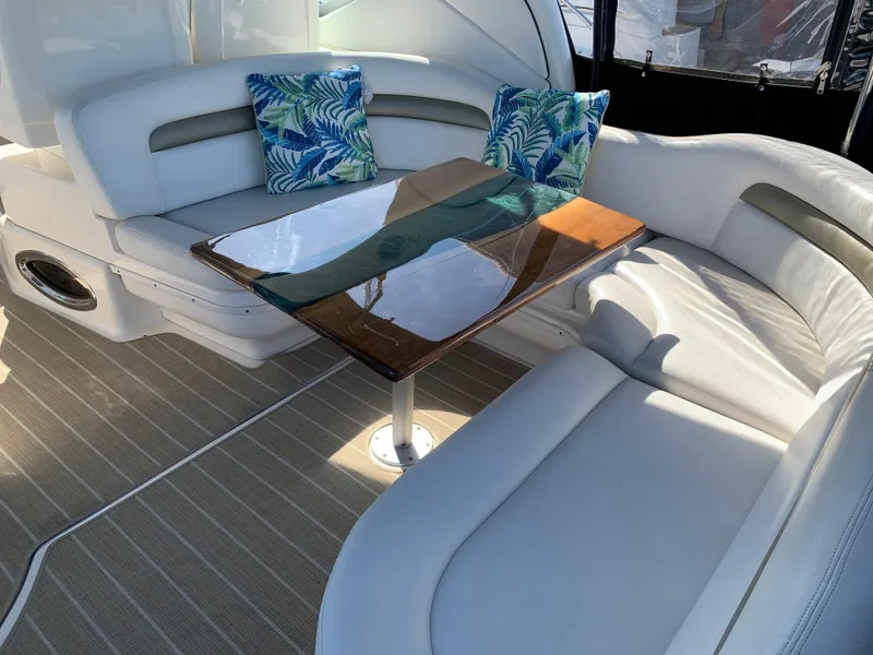 Slide: The Image of Luxurious seating area on a 2006 Sea Ray 340 Sundancer yacht with tropical cushions. - 16