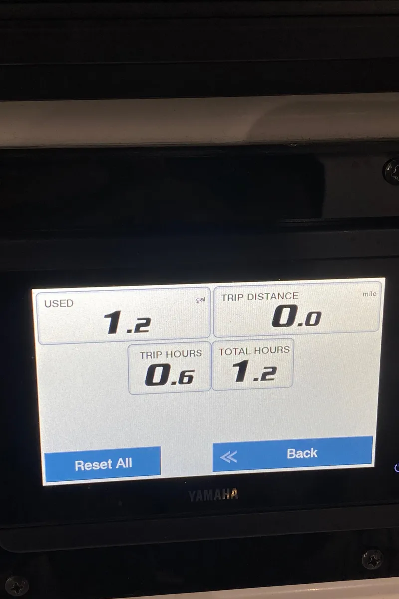 Slide: The Image of Dashboard display of a 2000 Triton 18 Sea Flight showing trip data and fuel usage. - 17