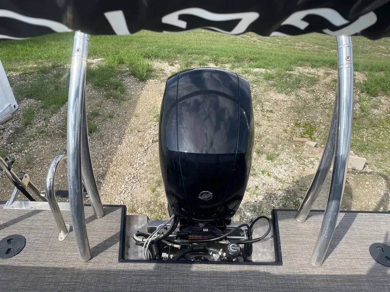 Slide: The Image of 2022 Misty Harbor Diamante Series boat with a powerful outboard motor. - 10