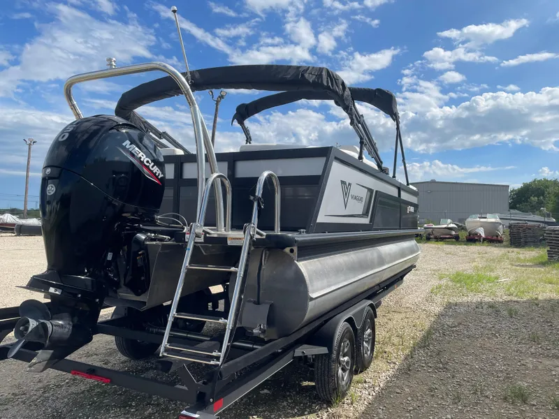 Slide: The Image of 2022 Misty Harbor Diamante Series pontoon boat with Mercury engine on trailer. - 3
