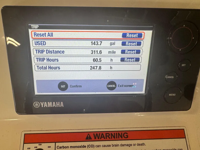 Slide: The Image of Yamaha boat display showing trip data: 143.7 gallons used, 311.6 miles, 60.5 hours. - 22