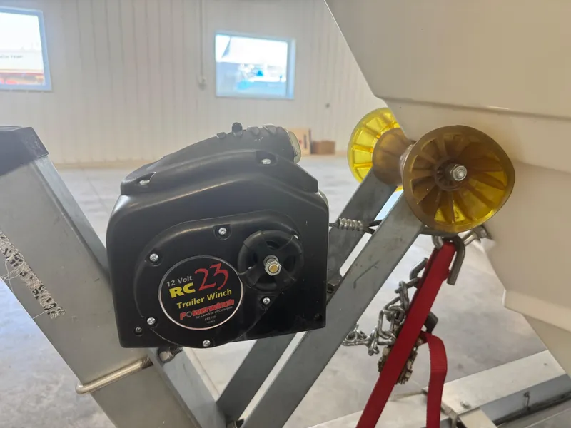 Slide: The Image of 12V RC23 trailer winch on 2011 Edgewater 228CC boat trailer. - 29
