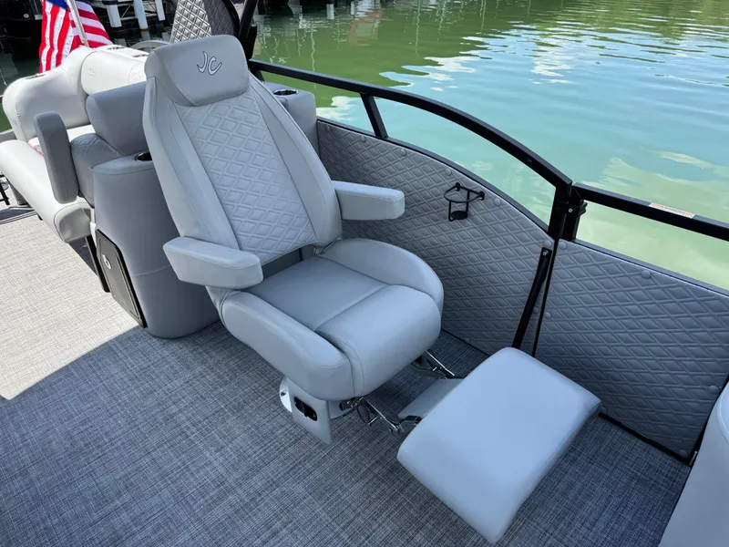 Slide: The Image of Luxurious seating on 2026 JC SportToon 24 TT DSL pontoon boat, featuring quilted upholstery. - 7