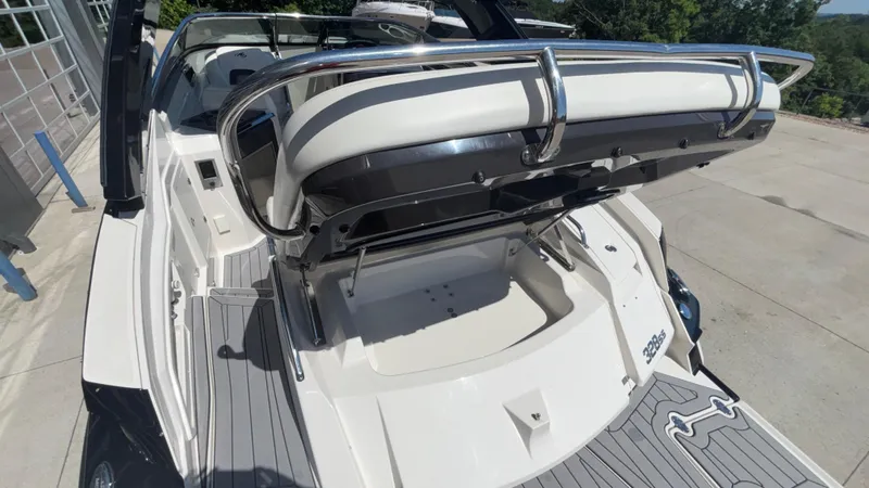 Slide: The Image of 2014 Monterey 328 Super Sport boat with sleek design and spacious seating area. - 42