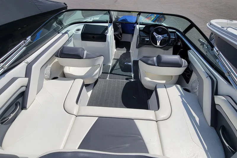 Slide: The Image of 2016 Yamaha Boats SX192 interior with seating and steering wheel, showcasing modern design. - 3