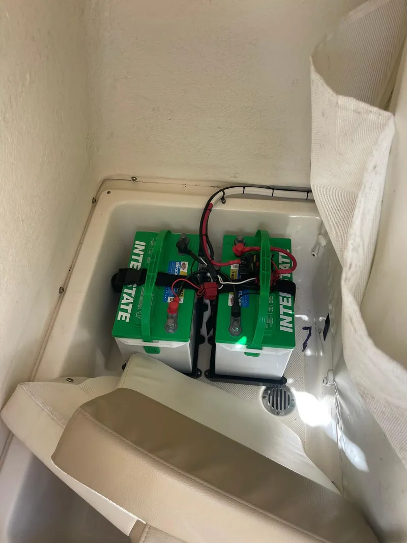 Slide: The Image of Batteries installed in a 2019 Pioneer 202 Sportfish boat compartment. - 15