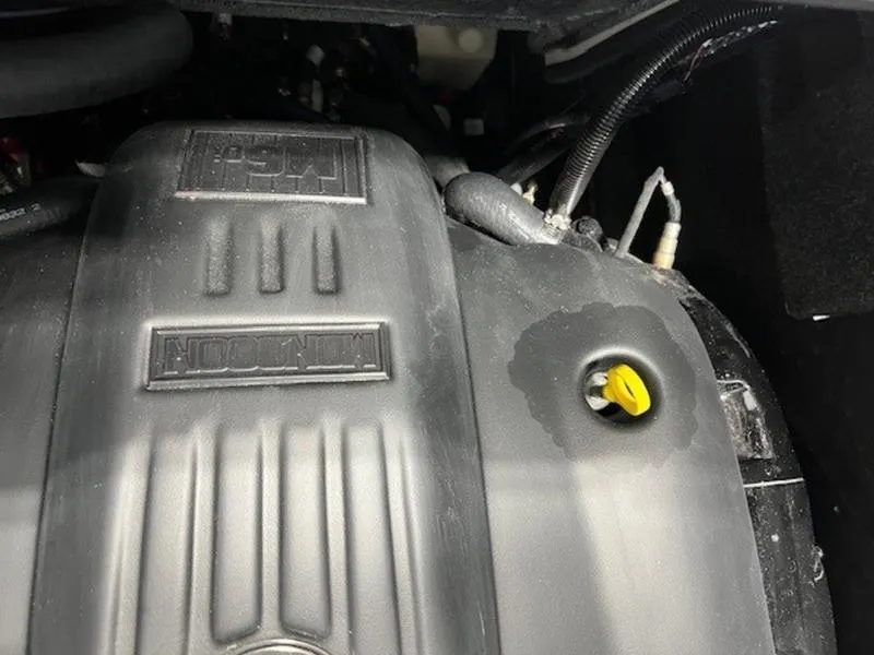 Slide: The Image of 2024 Axis T250 engine close-up with visible components and yellow cap. - 19