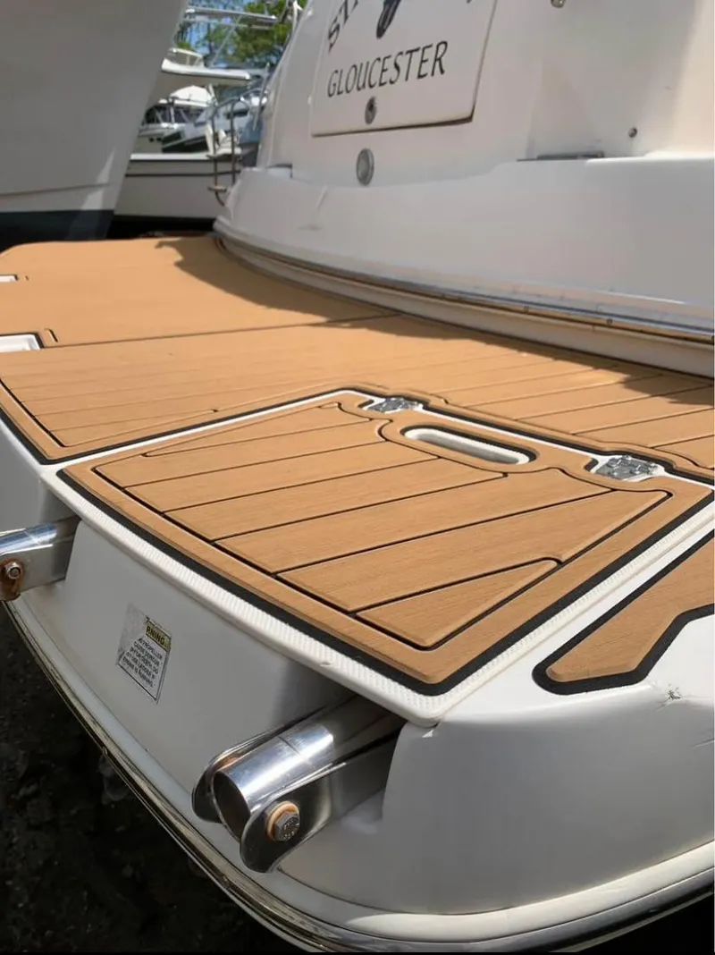 Slide: The Image of 2006 Rinker 300 Fiesta Vee boat with teak swim platform in Gloucester. - 5