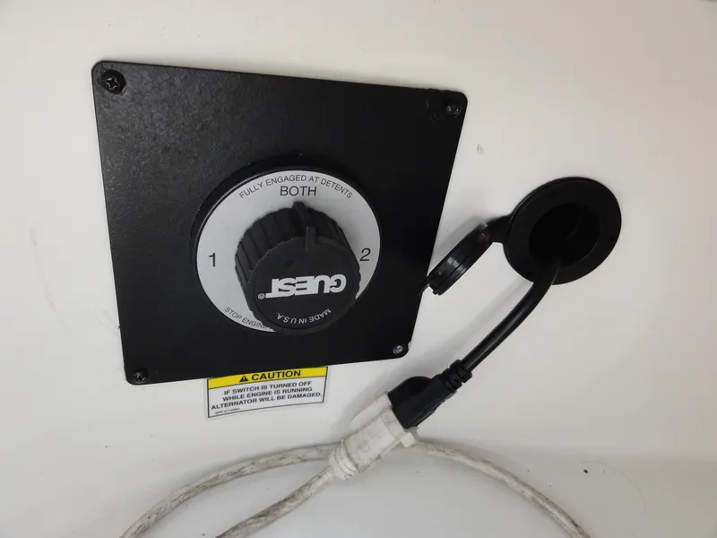 Slide: The Image of Battery switch panel on a 2009 Sea Ray 250 SLX boat. - 17
