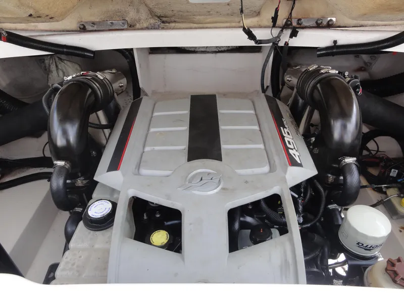 Slide: The Image of Engine compartment of a 2009 Sea Ray 250 SLX boat, featuring a 496 MAG engine. - 20
