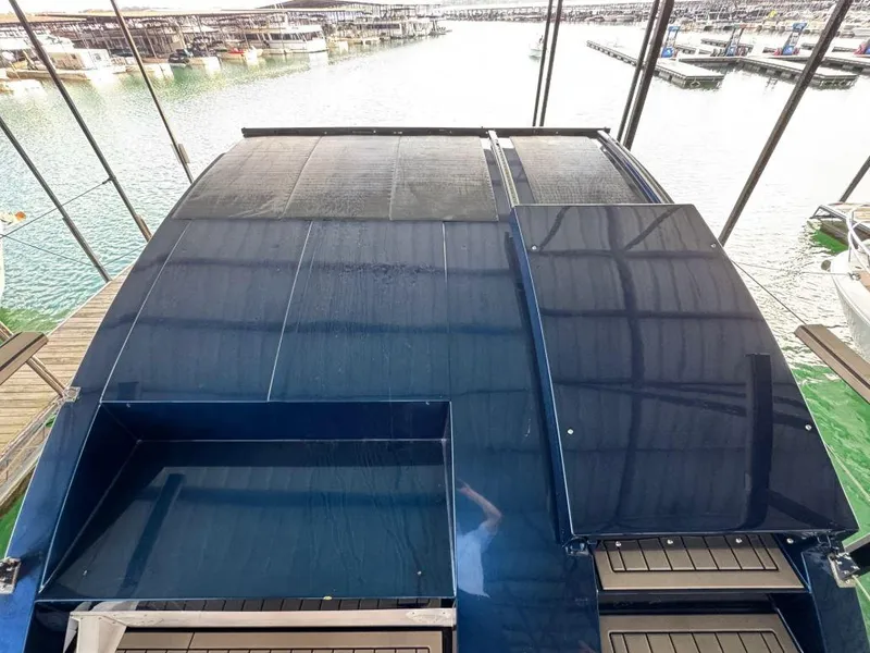 Slide: The Image of Navisyo Homes NV.08 houseboat roof, docked in marina, 2022 model. - 15