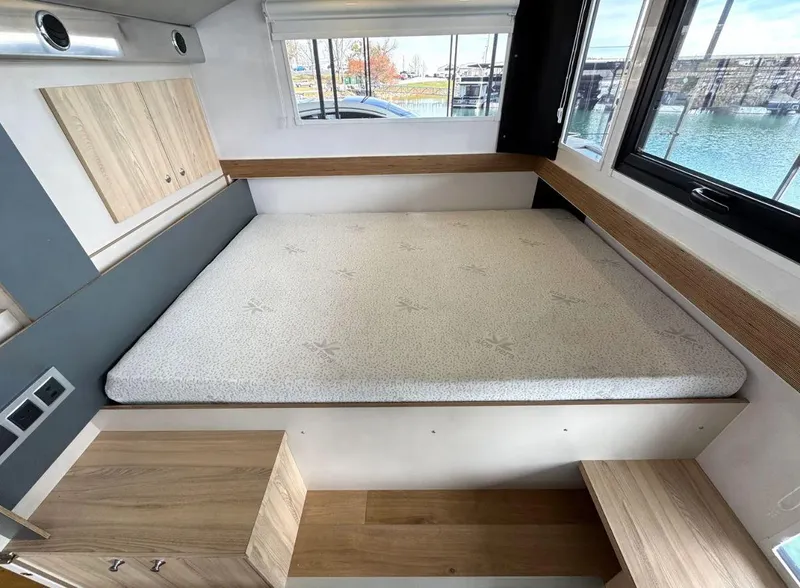 Slide: The Image of Modern Navisyo Homes NV.08 bedroom interior with a cozy bed and large windows, 2022 model. - 27