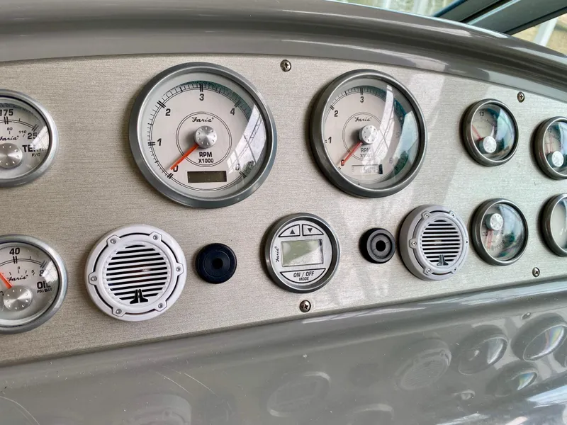 Slide: The Image of Dashboard of 2007 Cruisers Yachts 370 Express with gauges and controls. - 22