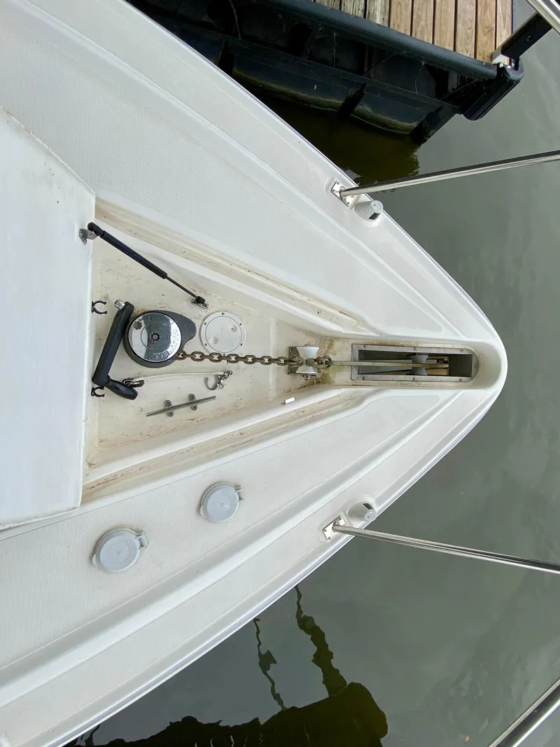 Slide: The Image of Bow of 2007 Cruisers Yachts 370 Express with anchor chain and deck fittings. - 27
