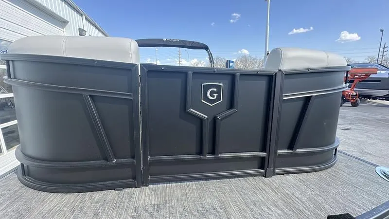 Slide: The Image of 2025 Godfrey Monaco 255 SB iMPACT pontoon boat with sleek black exterior design. - 10