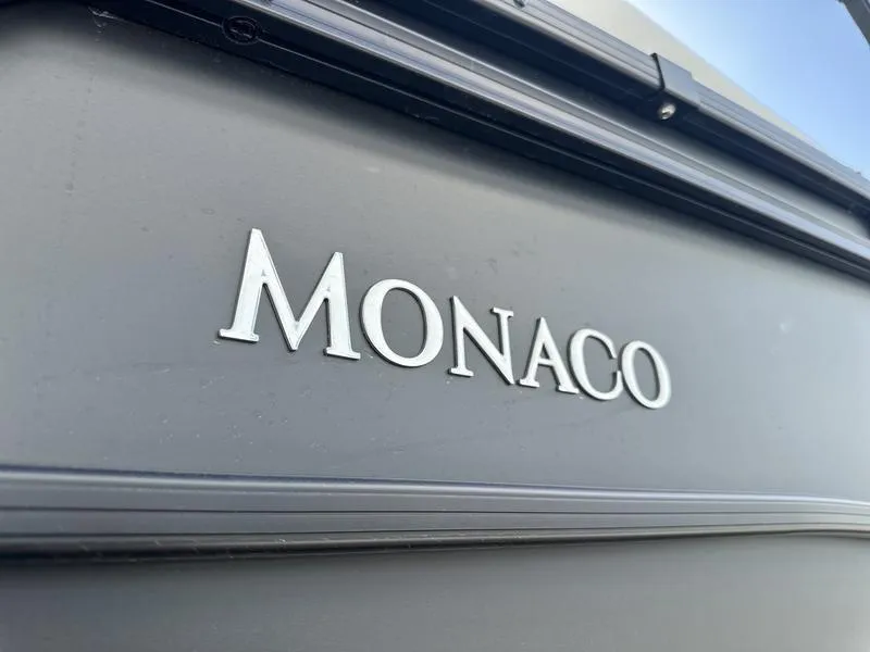 Slide: The Image of Monaco logo on 2025 Godfrey Monaco 255 SB iMPACT Package boat. - 17