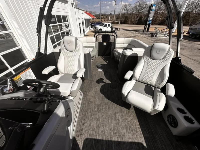 Slide: The Image of 2025 Godfrey Monaco 255 SB iMPACT pontoon boat interior with luxurious seating and modern design. - 3