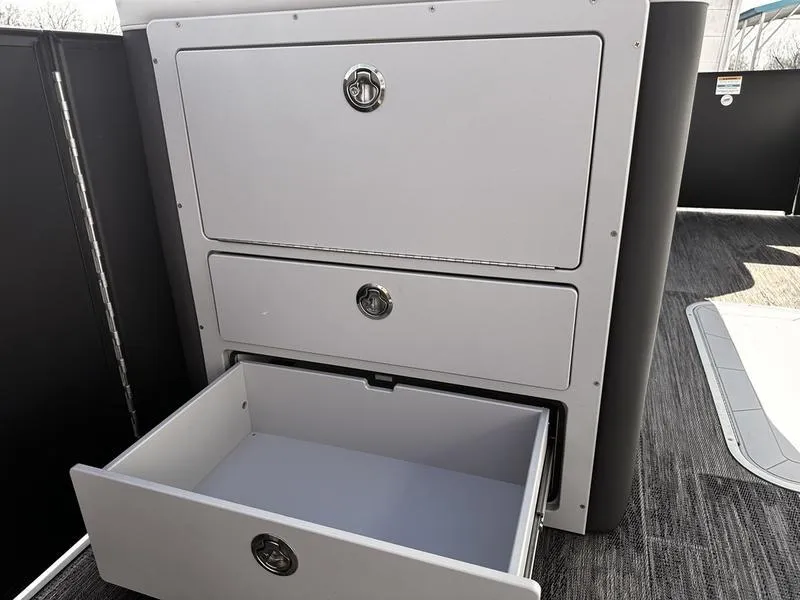 Slide: The Image of Open storage drawer on 2025 Godfrey Monaco 255 SB iMPACT pontoon boat. - 4