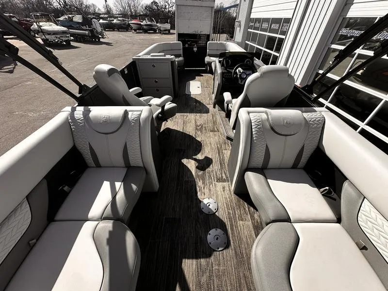 Slide: The Image of Luxurious interior of 2025 Godfrey Monaco 255 SB iMPACT pontoon boat, featuring plush seating. - 5