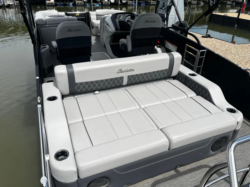 Slide: The Image of 2024 Barletta Lusso 23UC pontoon boat with luxurious seating and modern design. - 17