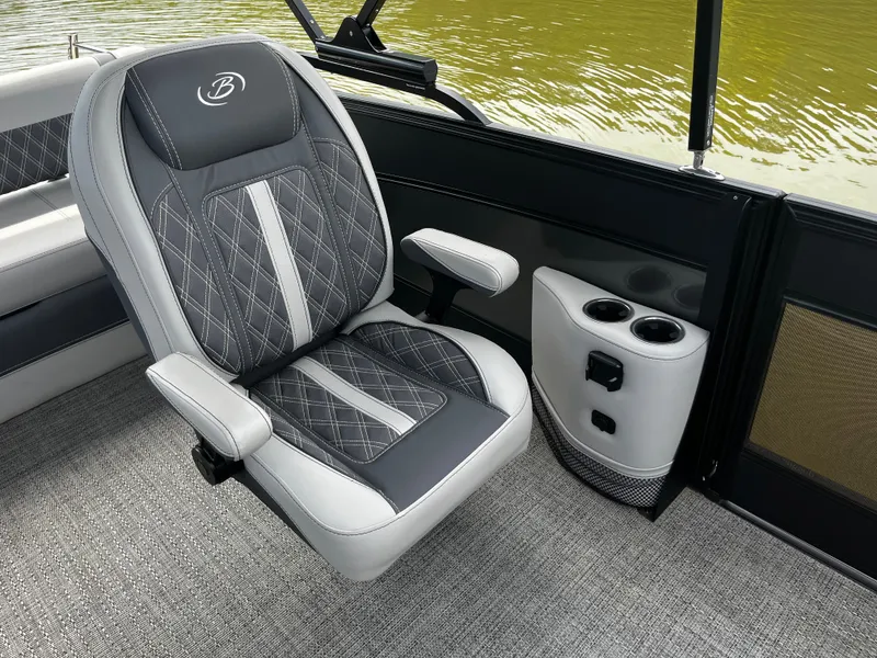 Slide: The Image of Luxurious seating in 2024 Barletta Lusso 23UC boat, featuring elegant design and cup holders. - 21