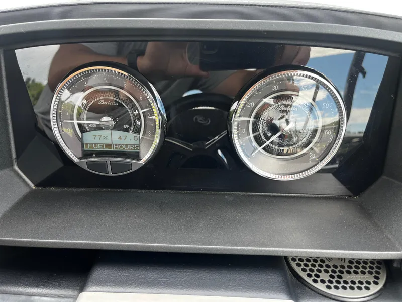 Slide: The Image of Dashboard of 2024 Barletta Lusso 23UC showing fuel and hours gauges. - 29