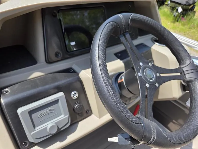 Slide: The Image of Steering wheel of 2025 Sun Tracker PARTY BARGE® 22 DLX pontoon boat. - 16