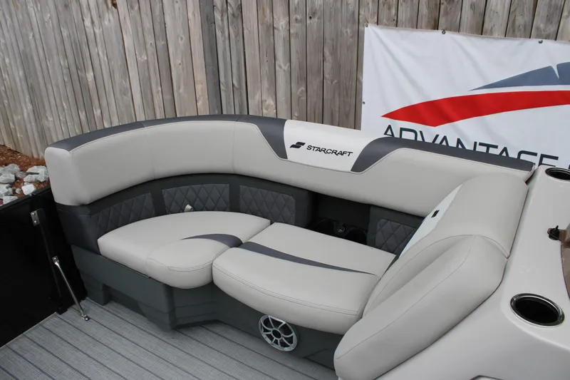 Slide: The Image of 2025 Starcraft SLS 3 boat seating with gray upholstery and logo, displayed outdoors. - 15
