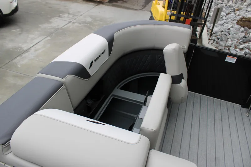Slide: The Image of 2025 Starcraft SLS 3 boat interior with gray and white seating, showcasing modern design. - 16