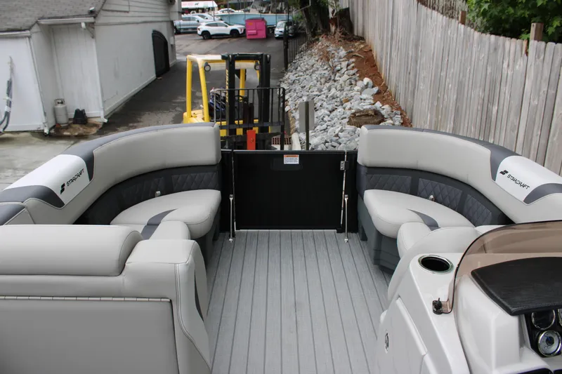 Slide: The Image of Luxurious interior of 2025 Starcraft SLS 3 pontoon boat with plush seating. - 18