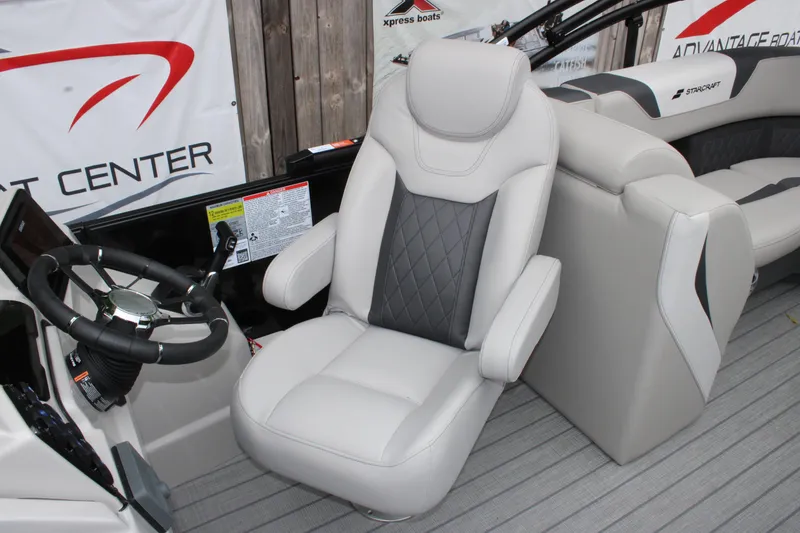 Slide: The Image of 2025 Starcraft SLS 3 boat interior with luxury seating and steering wheel. - 9