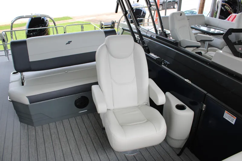 Slide: The Image of 2025 Starcraft EXS 3 DL boat interior with plush seating and modern design. - 9