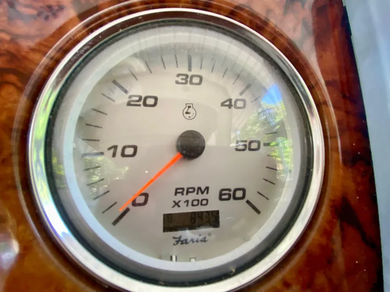 Slide: The Image of Close-up of a 2006 Rinker 360 Fiesta Vee tachometer showing RPM gauge. - 16
