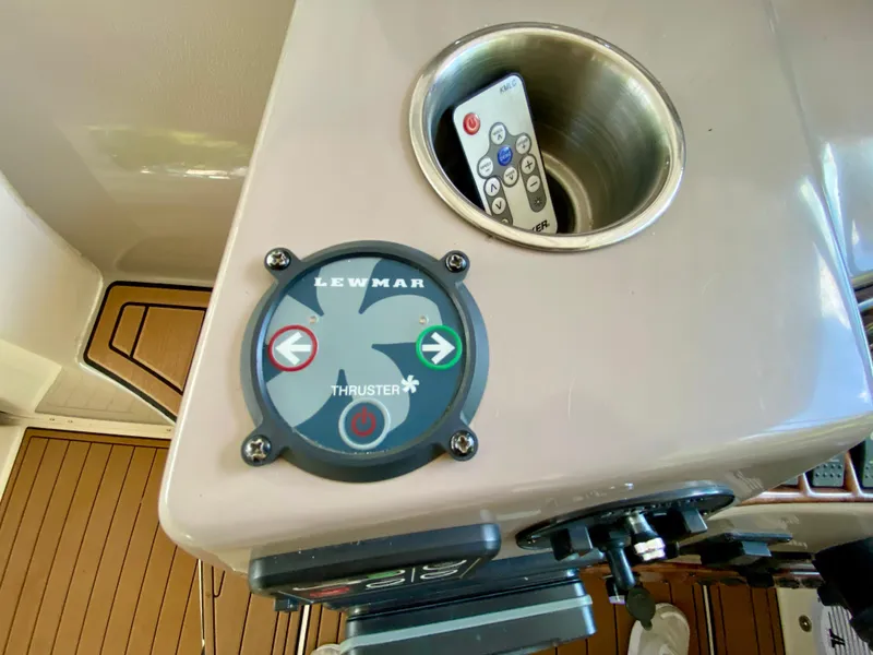 Slide: The Image of Control panel of a 2006 Rinker 360 Fiesta Vee with Lewmar thruster and remote. - 17