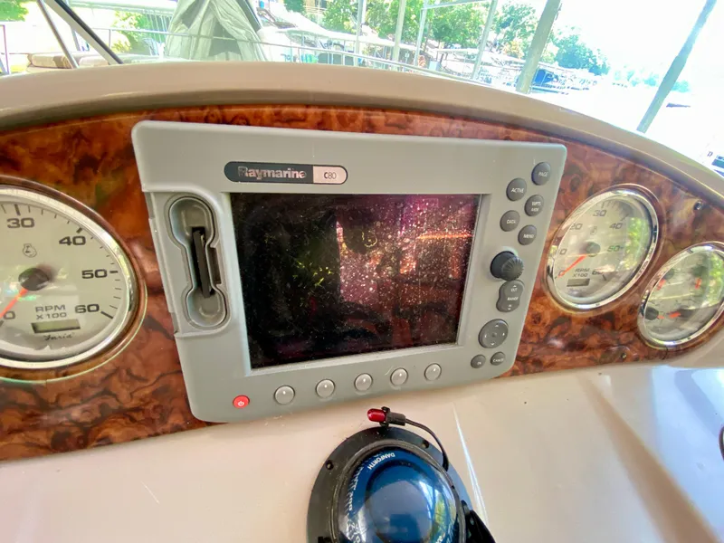 Slide: The Image of Dashboard of 2006 Rinker 360 Fiesta Vee with Raymarine C80 display. - 19