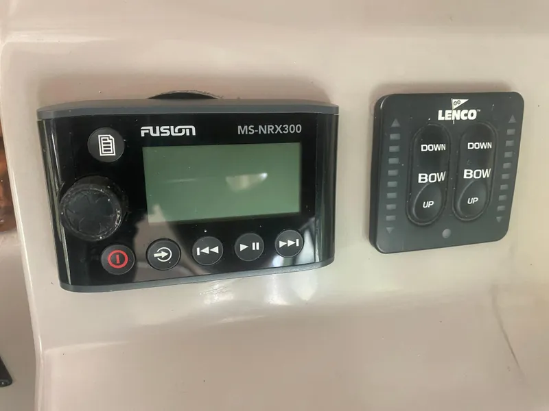 Slide: The Image of Fusion MS-NRX300 and Lenco control panel on 2006 Rinker 360 Fiesta Vee boat. - 25