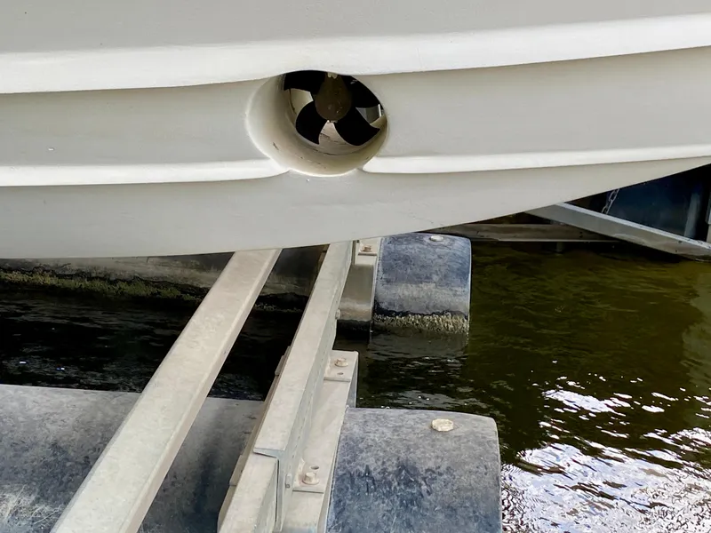 Slide: The Image of 2006 Rinker 360 Fiesta Vee boat on trailer, showing bow thruster detail. - 3
