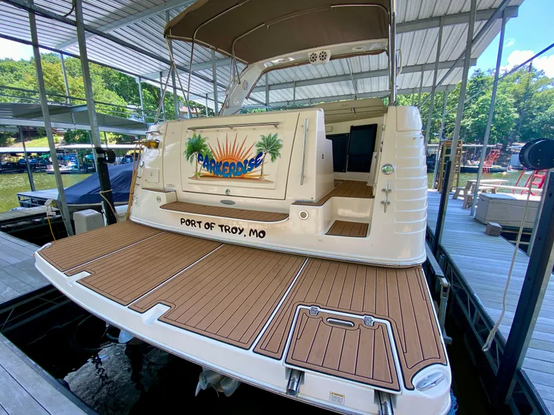 Slide: The Image of 2006 Rinker 360 Fiesta Vee boat docked at Port of Troy, MO, with custom name "Parkerdise." - 5